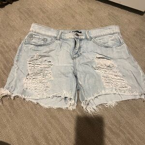 Ripped jean shorts light wash